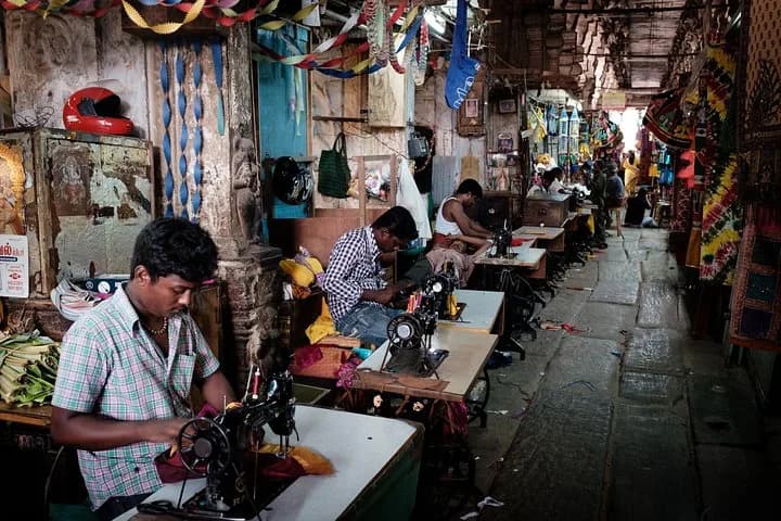 Discover the colorful markets of Madurai, stroll through the city's wi