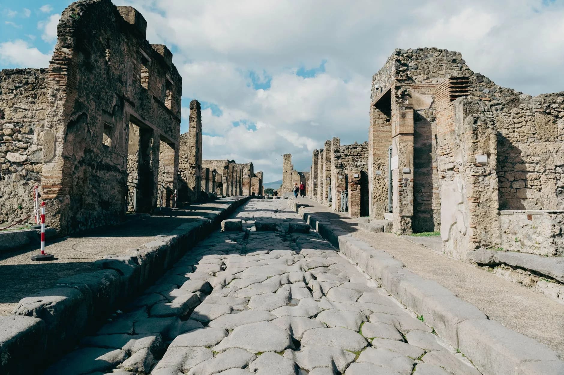 Pompeii — The ruins of Pompeii beneath Vesuvius